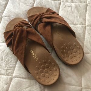 Vionic slides in the color of toffee.  Never worn just tried on.
